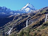 Rolwaling 05 02 Waterfalls Below Dorje Phagmo Just After Beding Three small waterfalls stream down below Dorje Phagmo (5636m) on the south side of the Rolwaling Valley between Beding and Na.